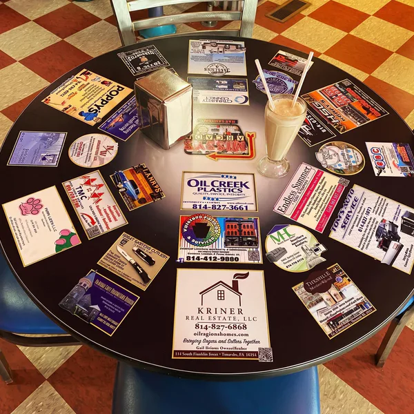Local business tabletop featuring Titusville spirit